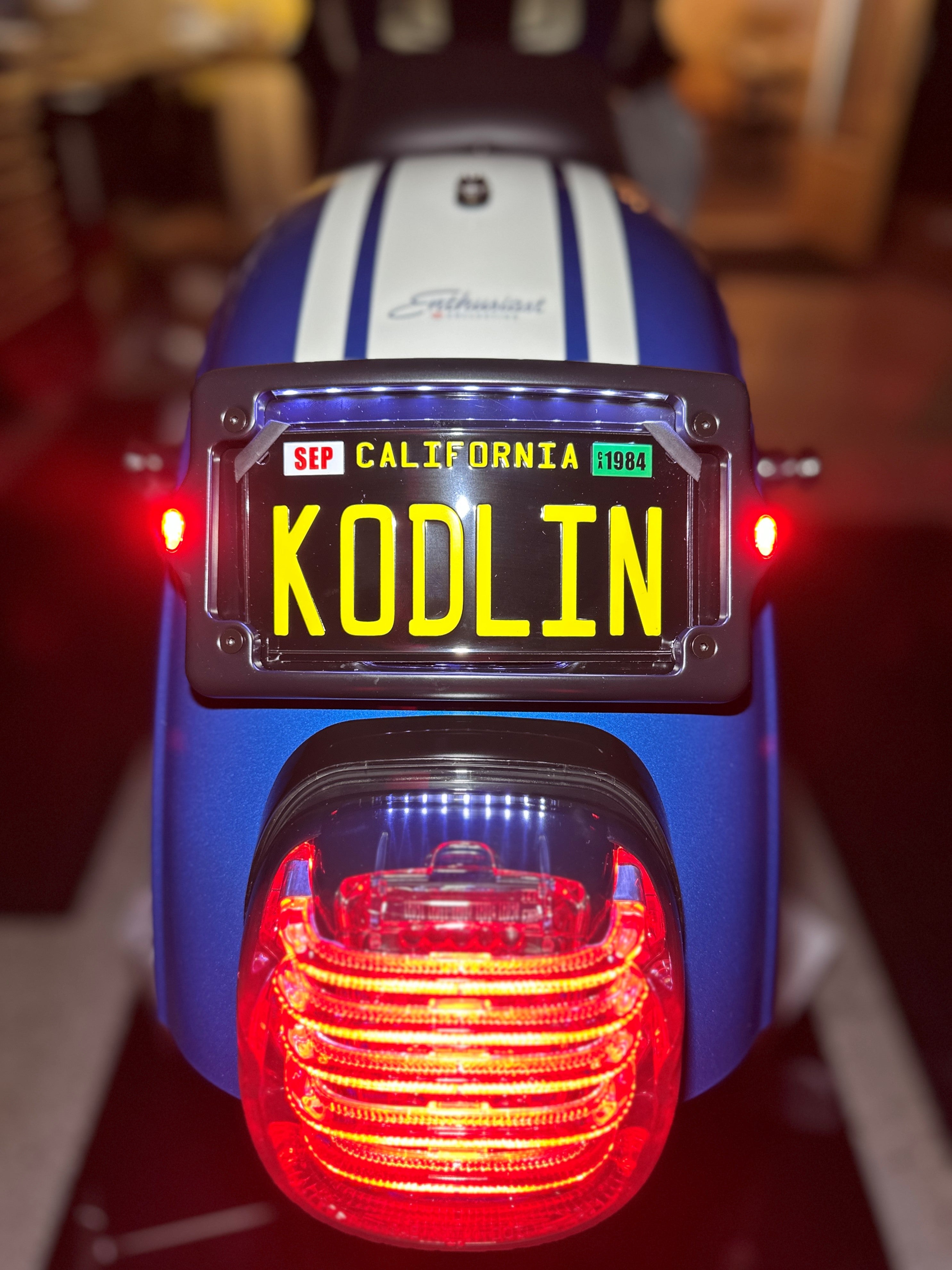 Kodlin Curved 3-bolt mounted Elypse 3-1 LED License Plate Kit in Black on Lowrider ST