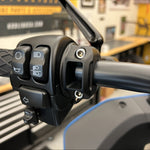 Black perch clamps on bike.