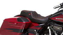A red and black motorcycle seat with diamond pattern stitching, designed for a Harley-Davidson Road Glide or Street Glide.